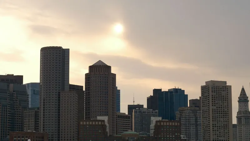 The Boston skyline and harbor at dusk